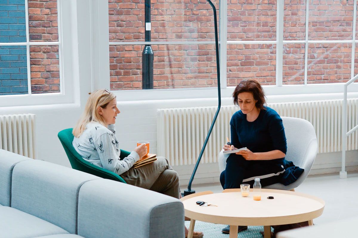 Two Women Sat In An Office Two Women Sat In An Office